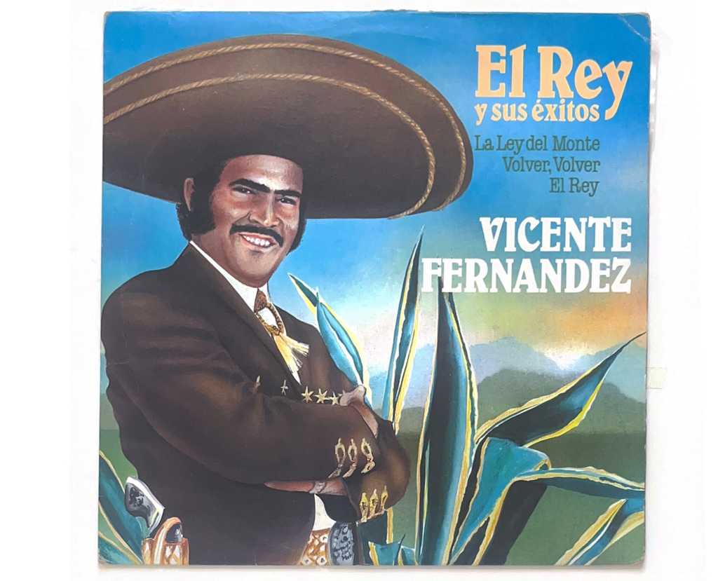 Illustrated portrait of Vicente Fernández in charro attire with agave plants and mountainous landscape—evoking rural Jalisco iconography and nationalist ranchera aesthetics.